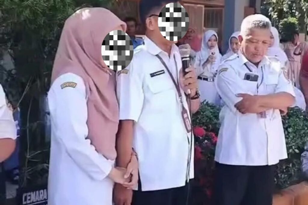 Viral Video Guru Gandengan Tangan Hadapi Demo Siswa